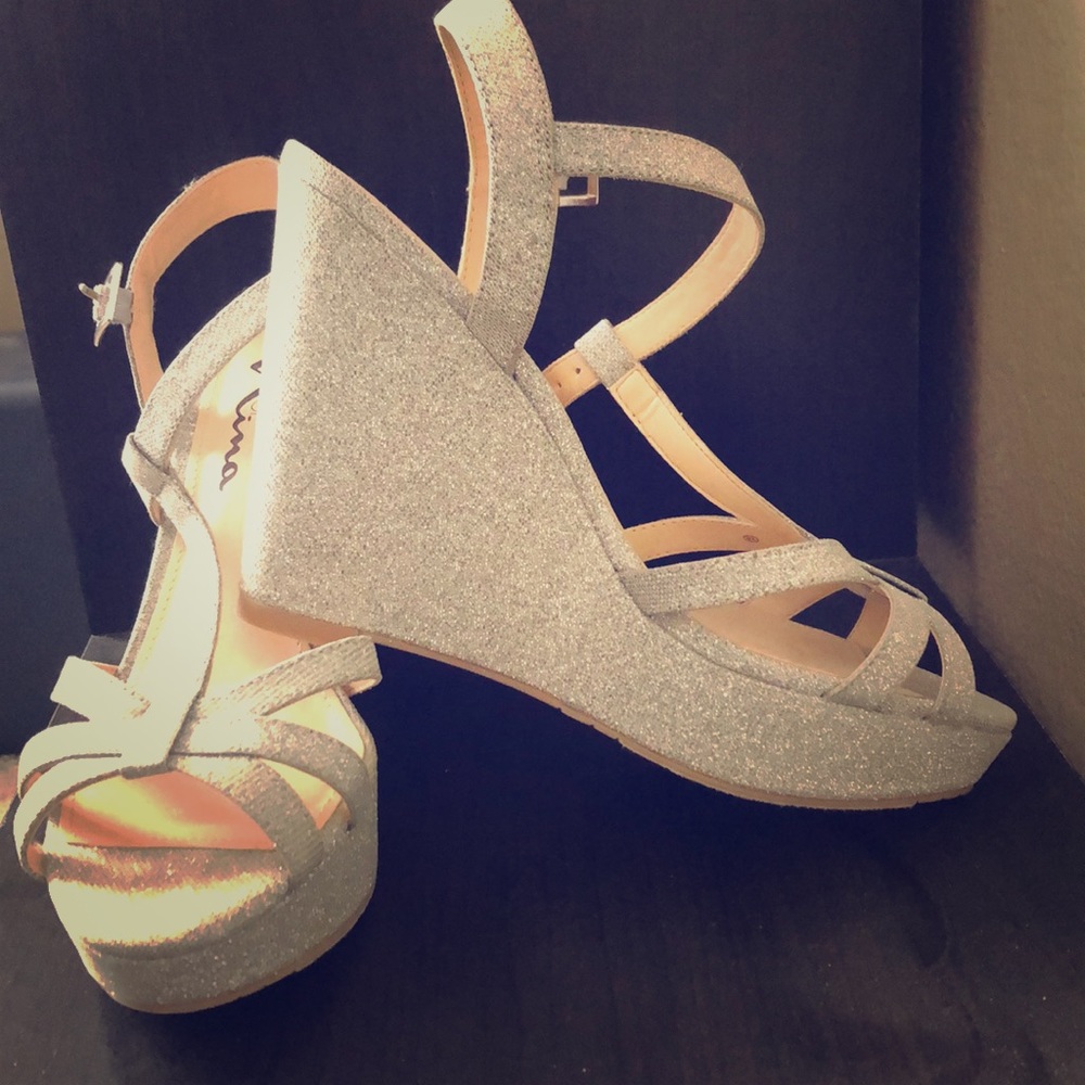 Silver sparkly wedges never worn.